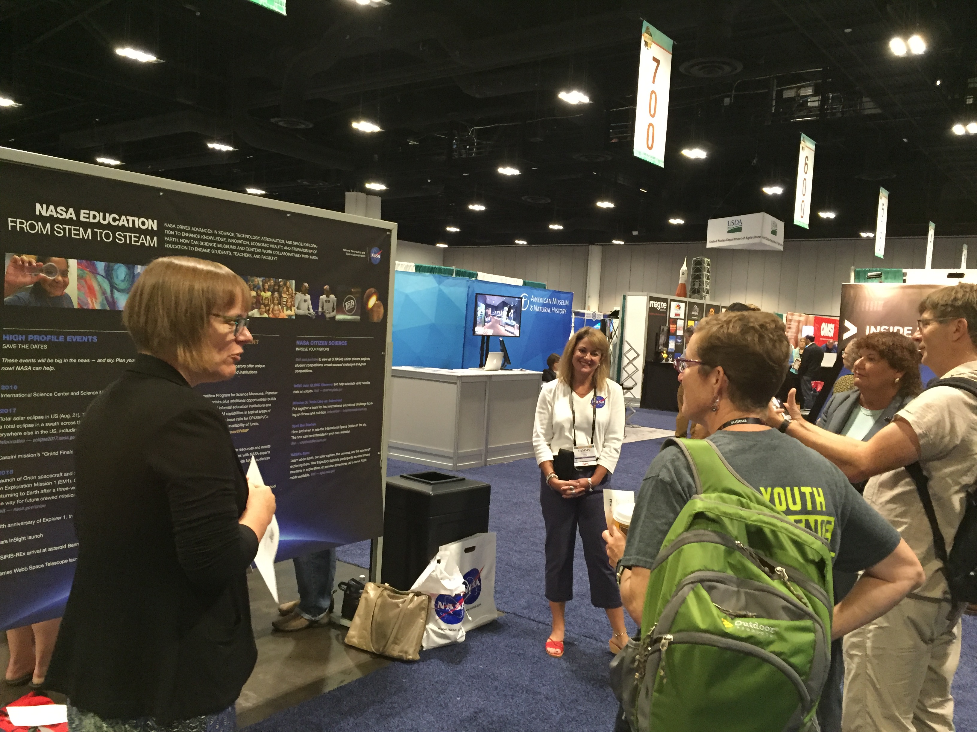 Amelia Chapman talks with attendees at the 2016 ASTC Conference