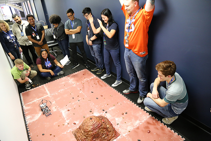 The green team cheers for their rover