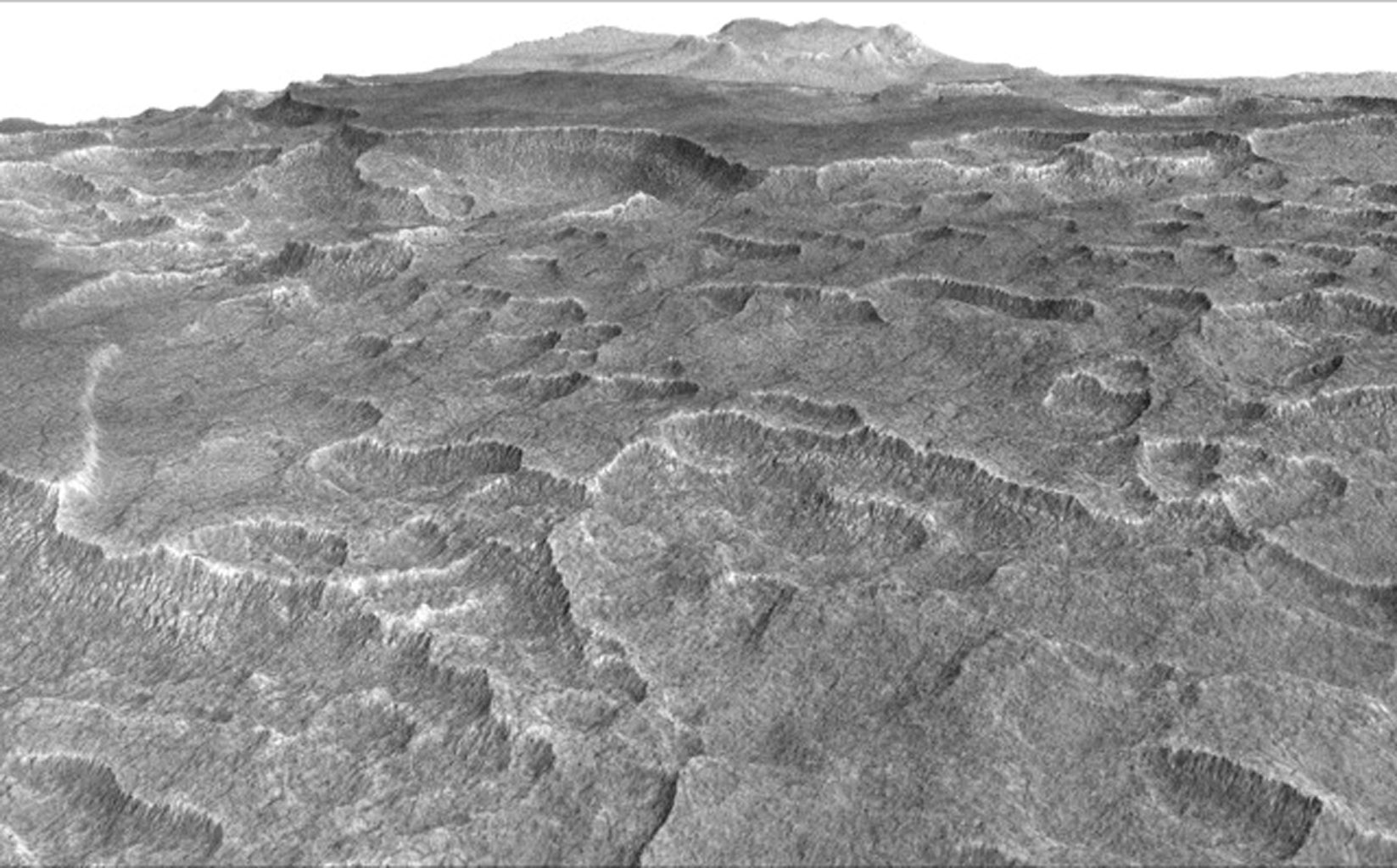 This vertically exaggerated view shows scalloped depressions in Mars' Utopia Planitia region, one of the area's distinctive textures that prompted researchers to check for underground ice, using ground-penetrating radar aboard NASA's Mars Reconnaissance Orbiter.
