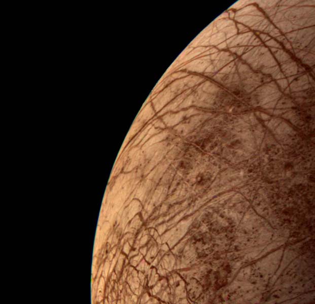Europa During Voyager 2 Closest Approach (NASA), icy moon of Jupiter thought to have an ocean beneath its icy crust - one of the other possible locatiosn for life in our solar system