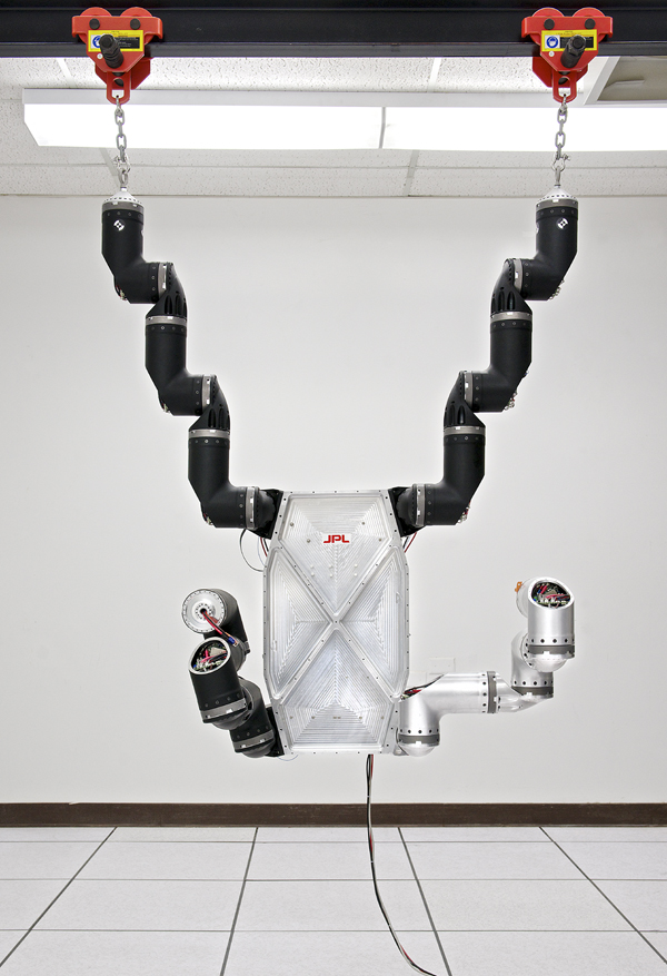 RoboSimian, a disaster-relief robot hanging from fixture