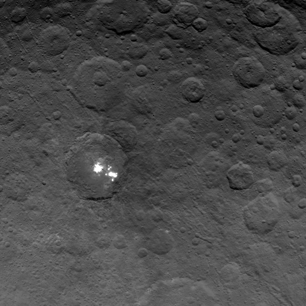 The brightest spots on dwarf planet Ceres are seen in this image taken by NASA's Dawn spacecraft on June 6, 2015. This is among the first snapshots from Dawn's second mapping orbit, which is 2,700 miles (4,400 kilometers) in altitude. The resolution is 1,400 feet (410 meters) per pixel.