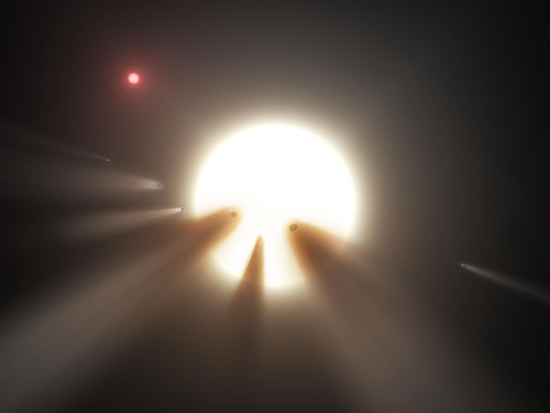 Esta ilustración de artista muestra una estrella detrás de un cometa fragmentado.