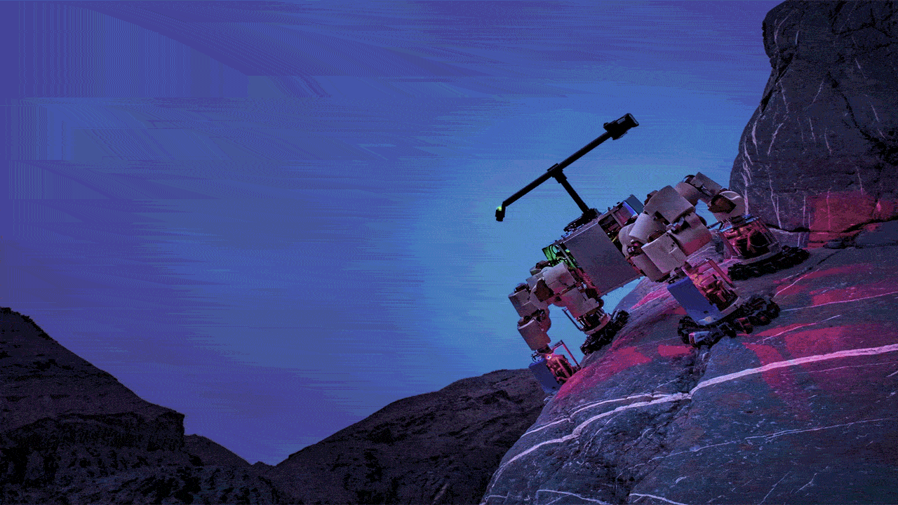A cube-shaped robot with chunky legs and large disk-like hands is perched downsloap on a rock as stars pass through the purple and blue night sky above