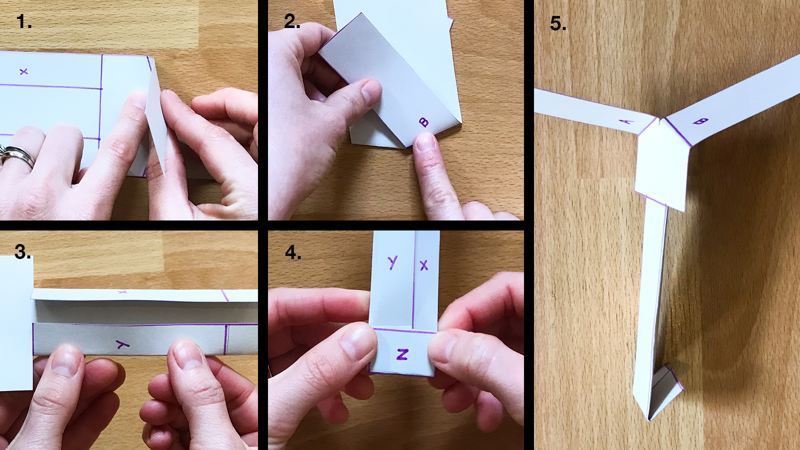 Folding along the solid lines of the paper helicopter template