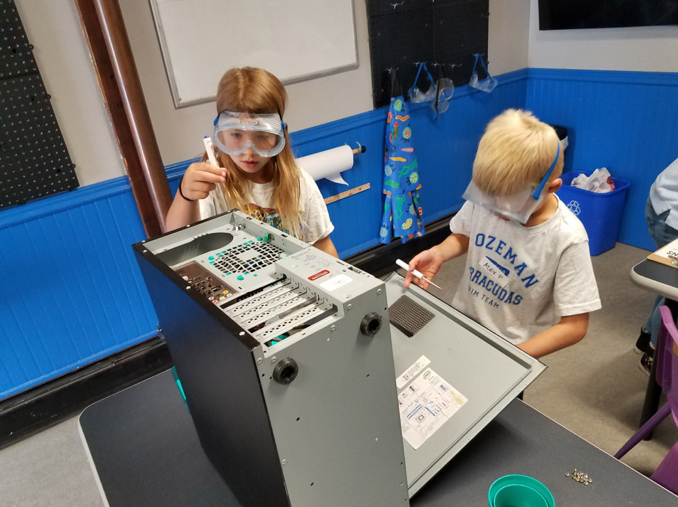 Two kids explore the STEAMlab at the Children's Museum of Bozeman