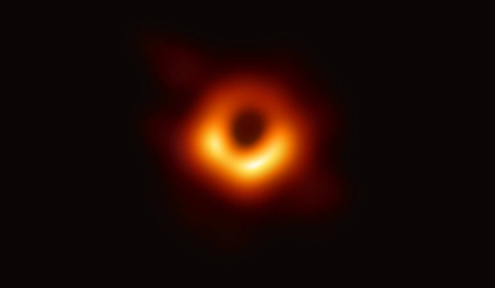 A warm glowing ring surrounds an empty blackness.