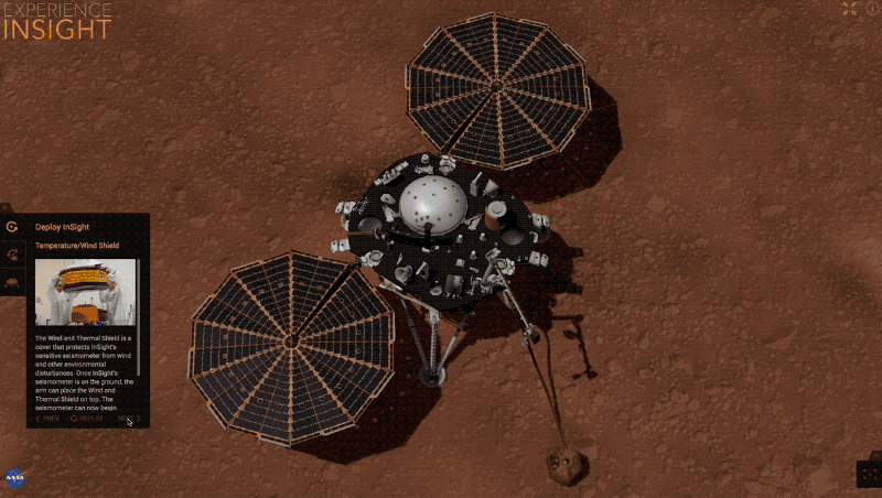Animation showing InSight lowering the wind shield over SEIS with its robotic arm