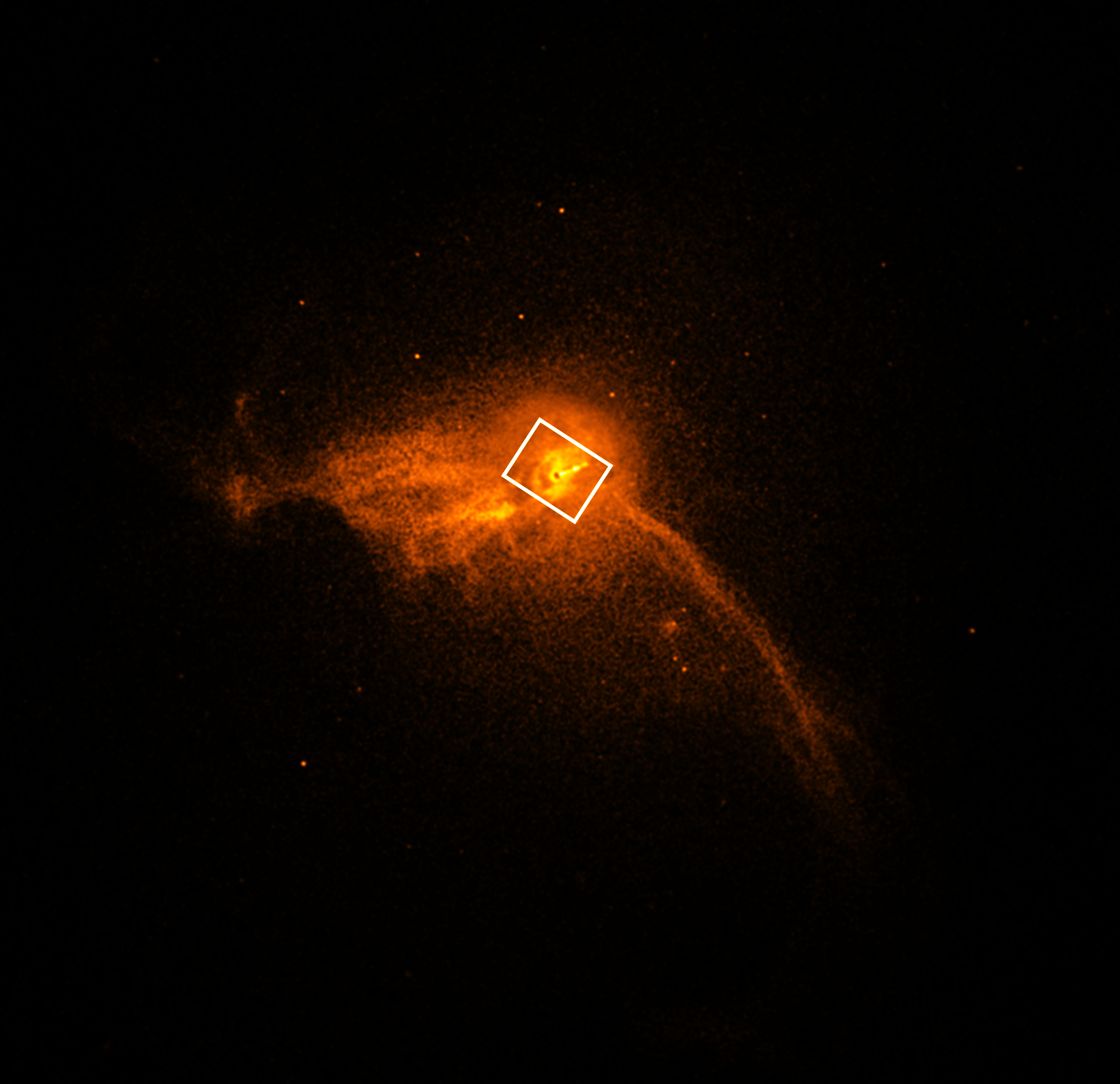 An image showing a handful of orange stars on the black background of space, with a small black circle in the center and a rectangle identifying the location of the black hole M87.