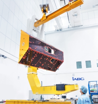 One of the GRACE-FO satellites in a clean room.