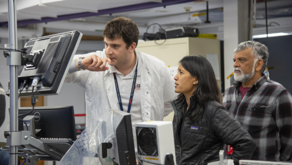 Members of NASA's Mars Helicopter project observe a flight test. The image was taken on Jan. 18, 2019 as the flight model of the Mars Helicopter was tested in the Space Simulator at NASA's Jet Propulsion Laboratory in Pasadena, California.