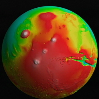 Mars in false color revealing Tharsis Montes area of volcanic activity.