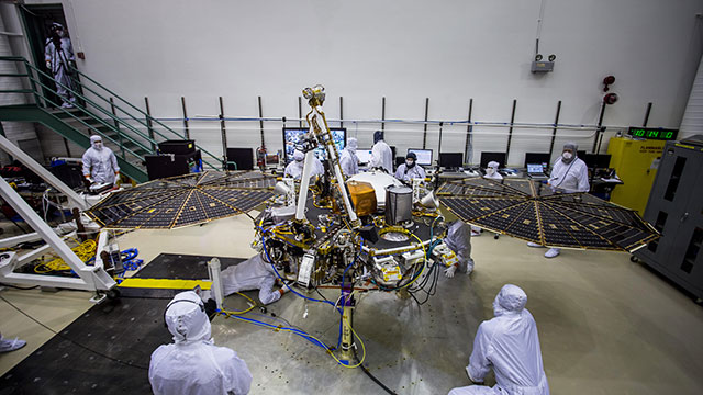 Engineers at Lockheed Martin Space, Denver, test the solar arrays on NASA’s InSight lander