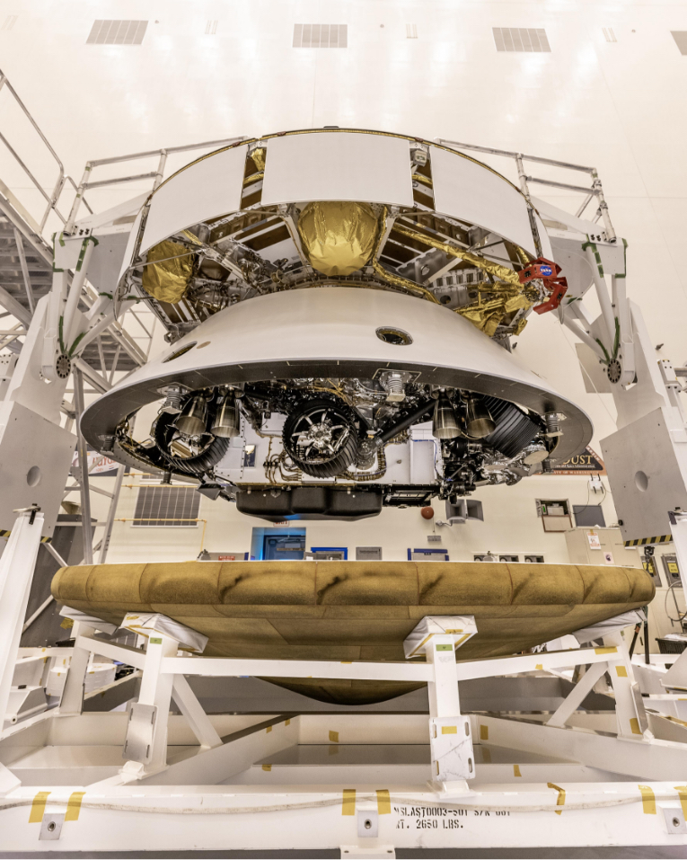 The Mars 2020 Perseverance rover mission's disk-shaped cruise stage sits atop the back shell, which contains the powered descent stage and Perseverance rover, in this image taken on May 28, 2020, at Kennedy Space Center in Florida.