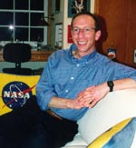 Marc Rayman relaxes in his space memorabilia room.