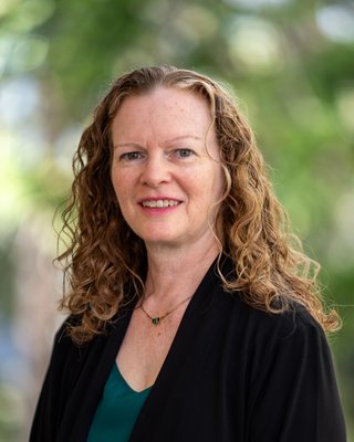 A profile photo of Dr. Angelyn Moore