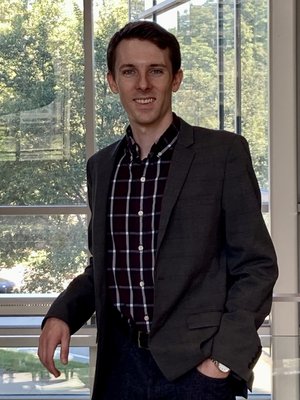 A profile photo of Dr. Justin Mansell