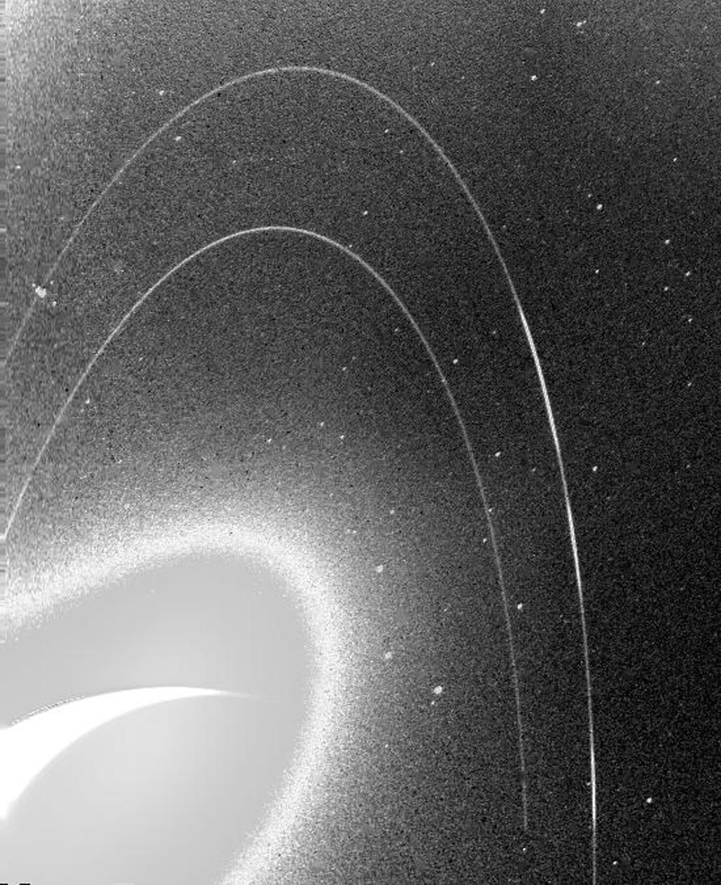 This wide-angle image from NASA's Voyager 2, taken in 1989, was taken through the camera's clear filter, and was the first to show Neptune's rings in detail.