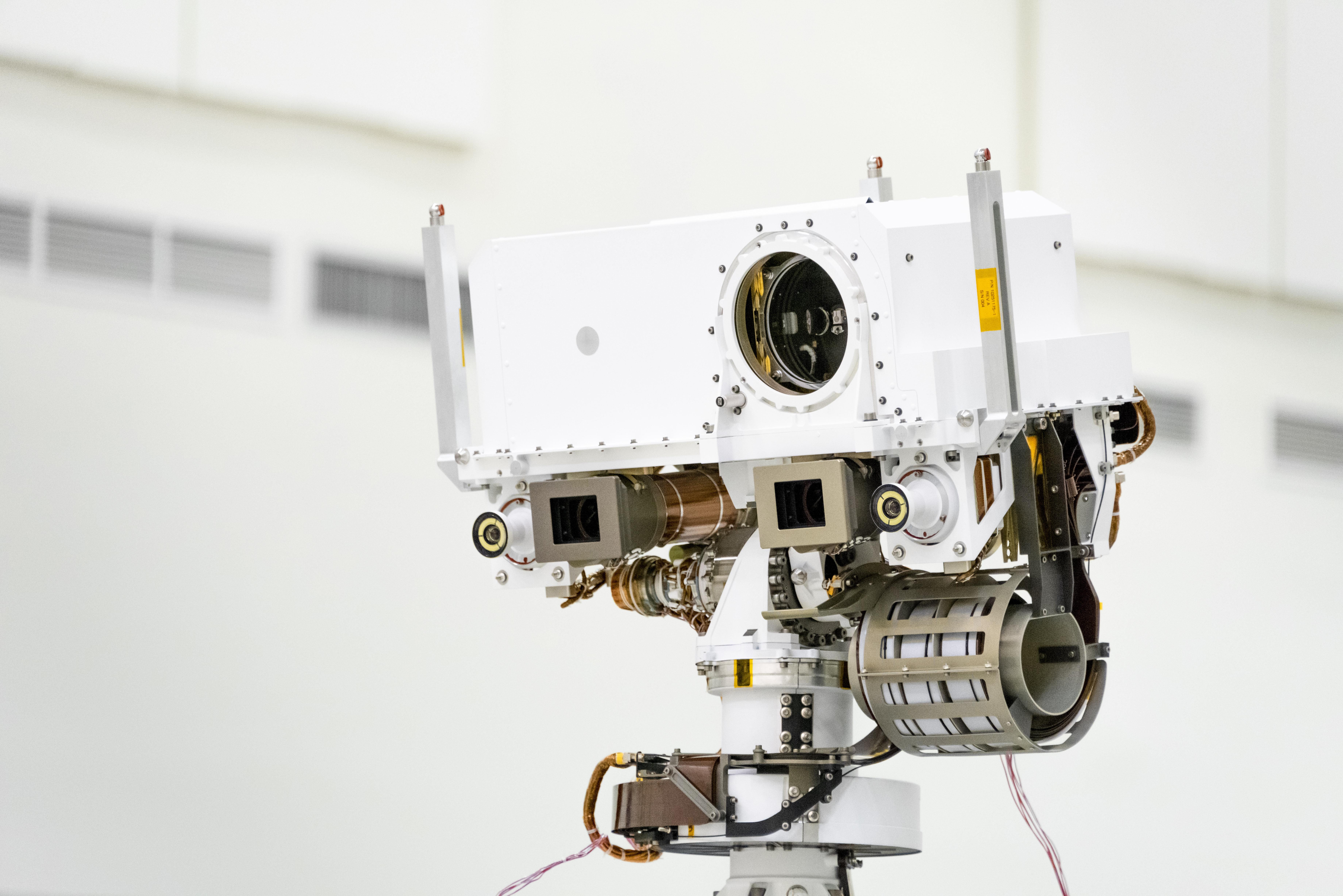 This image shows a close-up of the head of Mars 2020s remote sensing mast. The mast head contains the SuperCam instrument.